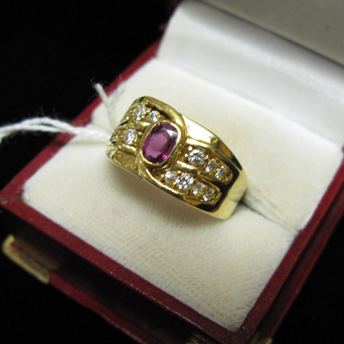 Appraisal: MAN'S RUBY DIAMOND AND FOURTEEN KARAT GOLD RING set with