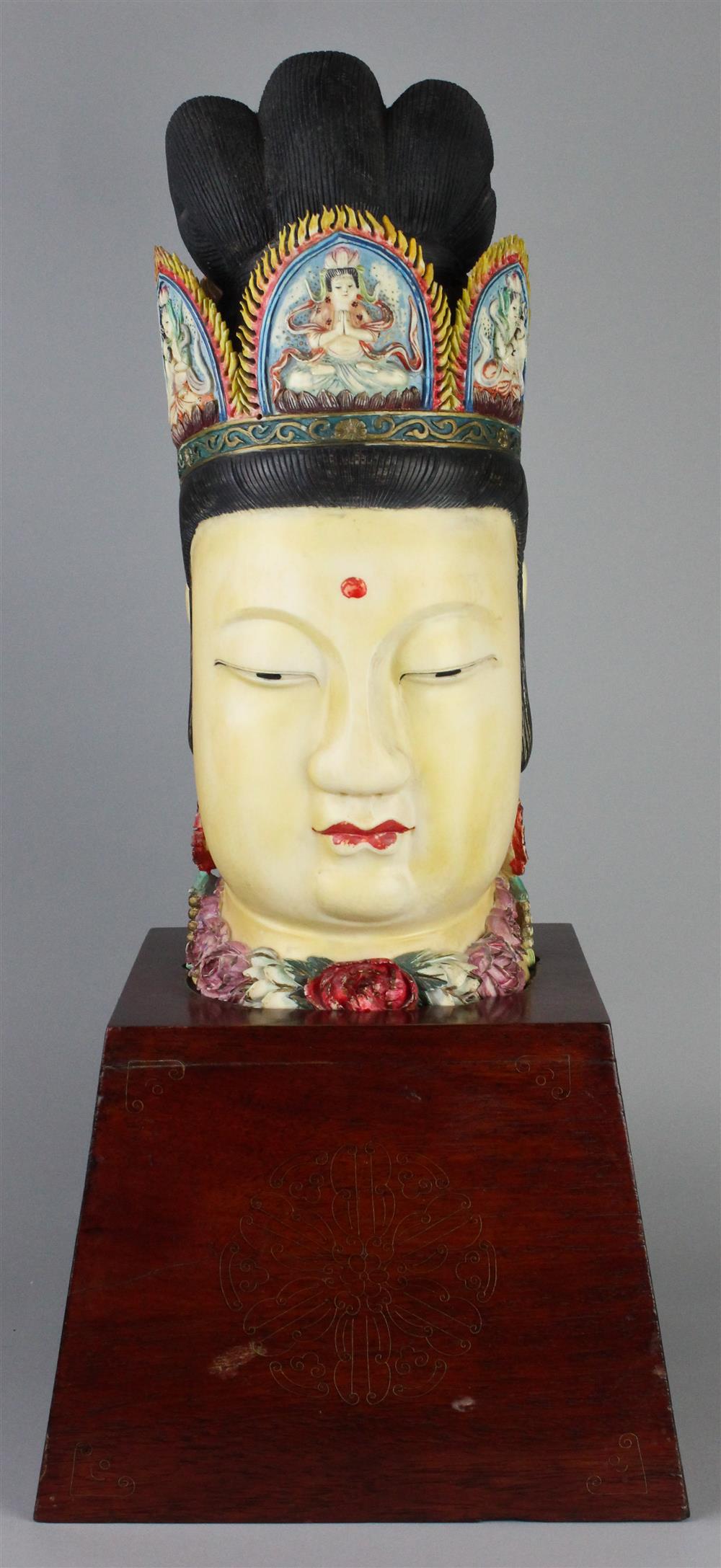 Appraisal: CHINESE POLYCHROMED IVORY HEAD OF GUANYIN LATE TH CENTURY the