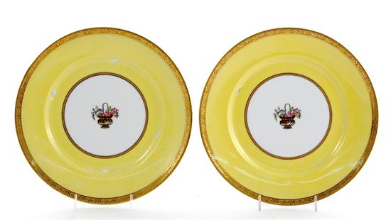 Appraisal: Haviland porcelain plates gilt and yellow border centering basket of