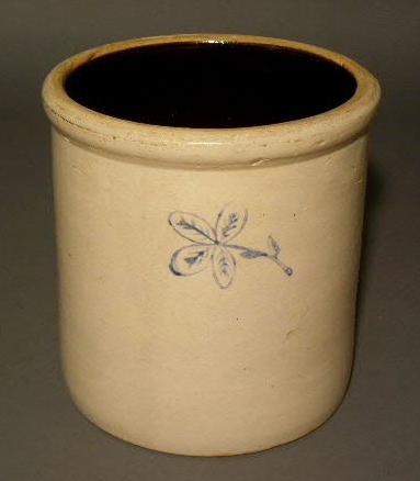 Appraisal: One-gallon stoneware jar with blue floral decoration h x d