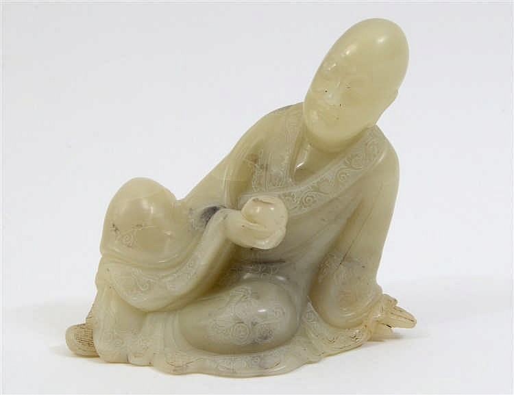 Appraisal: CHINESE CARVED SOAPSTONE SEATED LOHANThe pale green with gray inclusions