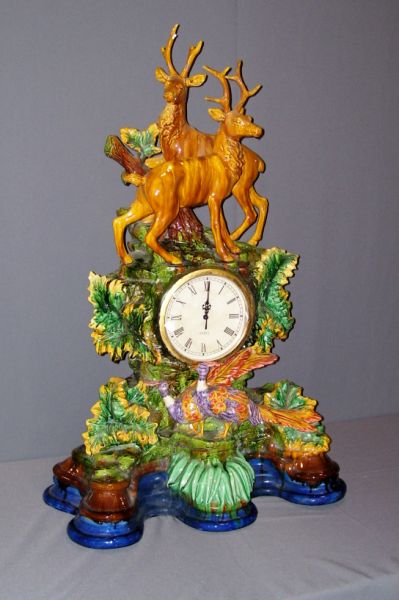 Appraisal: Majolica Style Mantle Clock Massive mantle clock with decorated foliage