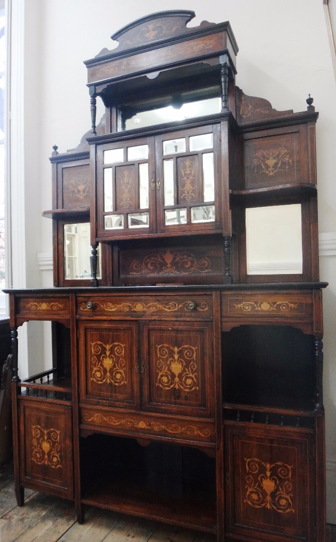 Appraisal: A late Victorian rosewood boxwood strung chiffonier with panels of