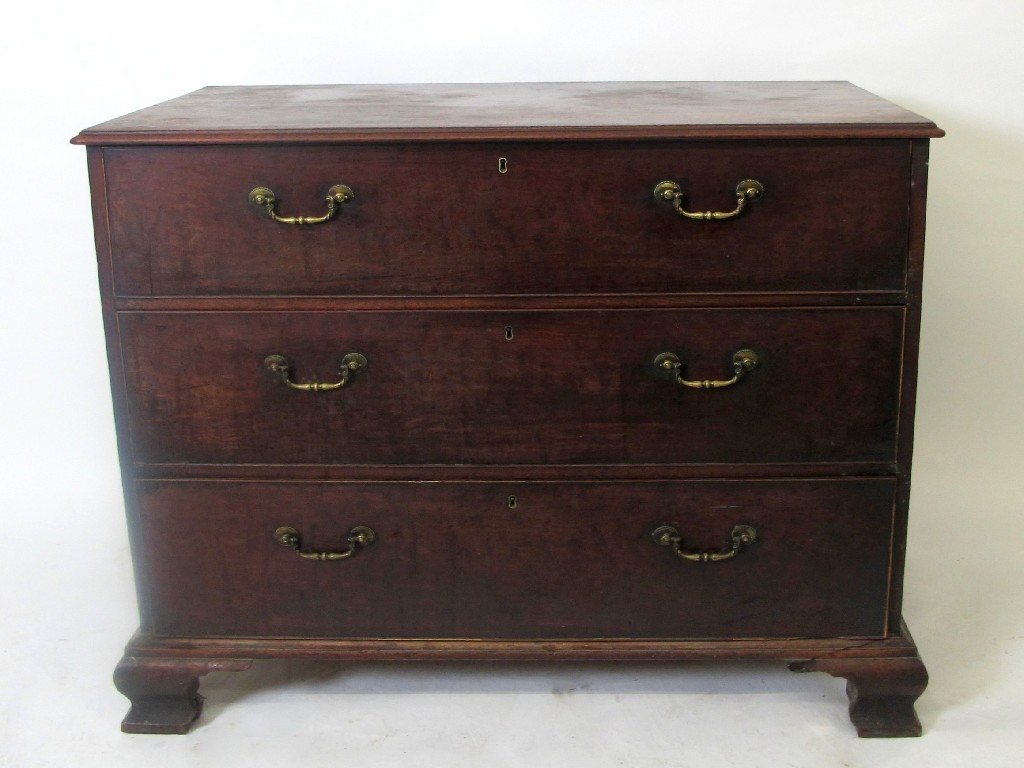 Appraisal: A George III mahogany chest of drawers with three graduated