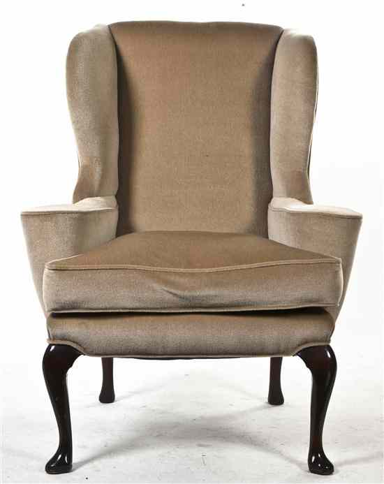 Appraisal: A Georgian Style Mahogany Wingback Armchair having upholstered back arms