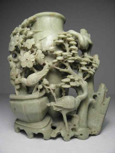 Appraisal: Chinese carved soapstone vase Intricately carved landscape scene with birds