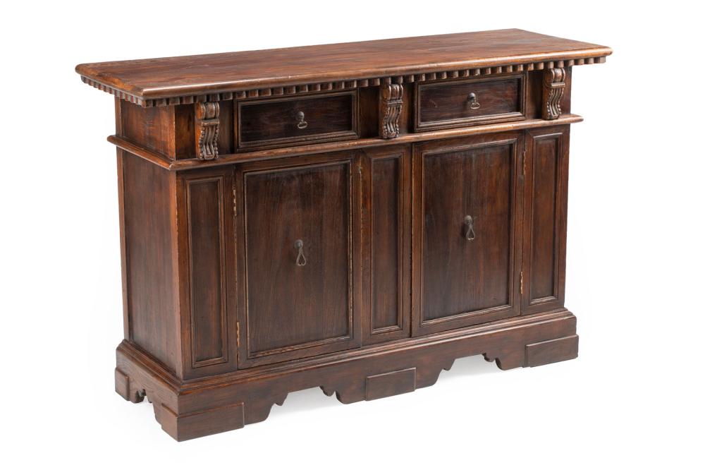 Appraisal: Italian Renaissance-Style Carved Walnut Credenza dentilated top two frieze drawers