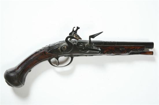 Appraisal: EUROPEAN FLINTLOCK PISTOL Nineteenth century Elaborate openwork steel sideplate and