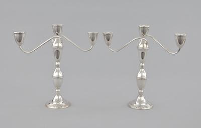 Appraisal: A Pair of Duchin Sterling Silver Convertible Candlesticks The weighted