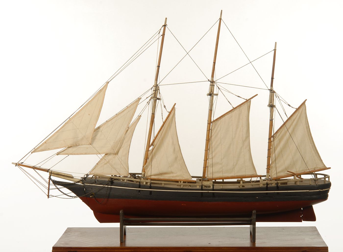 Appraisal: MODEL OF A TOPSAIL SCHOONER Hull painted black above waterline