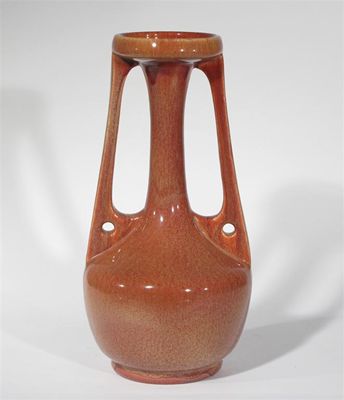 Appraisal: A Bretby Pottery Secessionist vase bottle form with flanking stylised