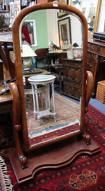 Appraisal: A LARGE VICTORIAN MAHOGANY CHEVAL MIRROR with arched top and