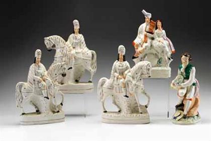 Appraisal: Five Staffordshire figural groups th century Including three huntsmen on