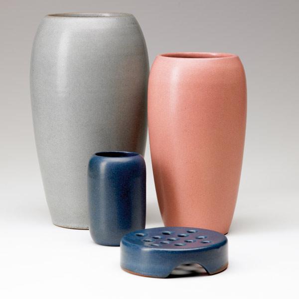 Appraisal: MARBLEHEAD Three vases in gray pink and blue and a