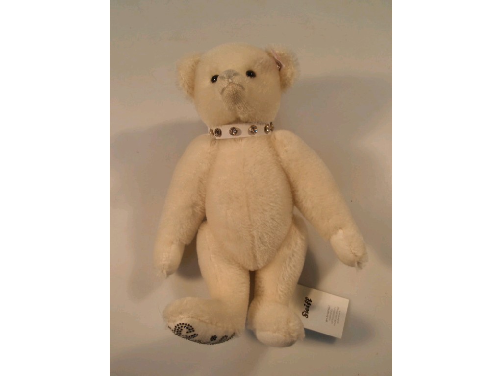 Appraisal: A modern Steiff teddy bear with a white mohair coat