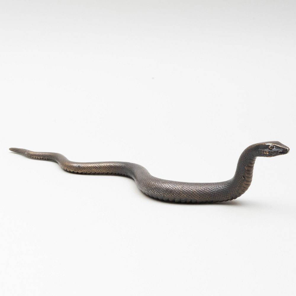 Appraisal: Japanese Bronze Figure of a Snake Cast character mark in