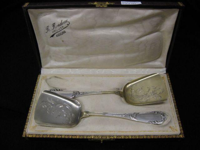 Appraisal: Pair of European Silver Ice Cream Servers elaborate floral on