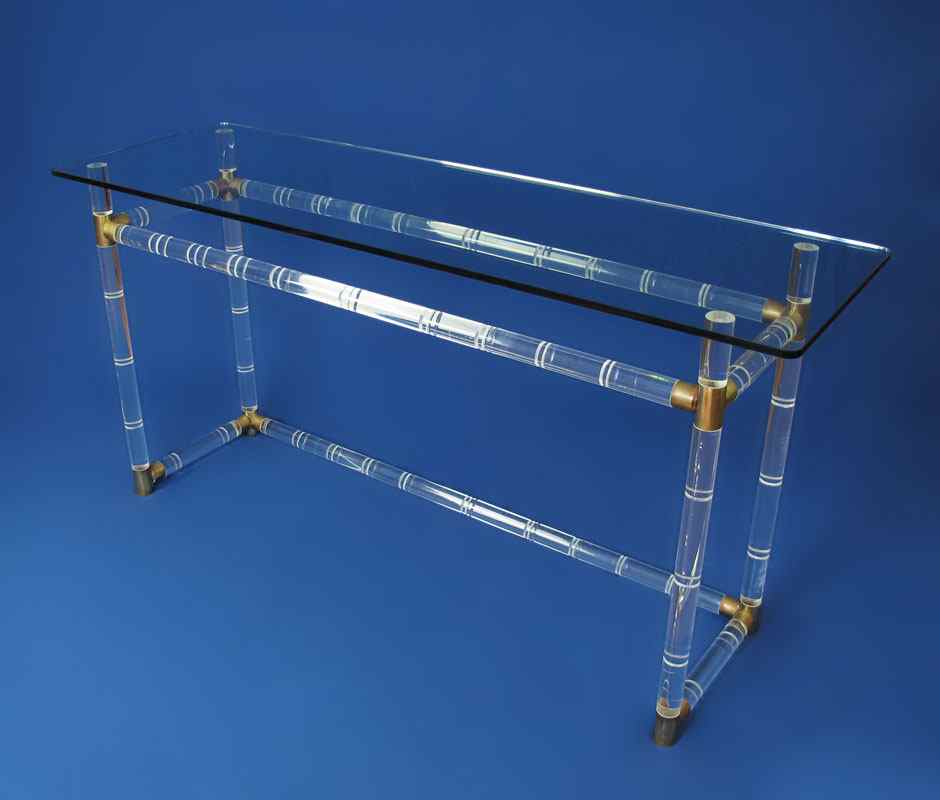 Appraisal: CHARLES HOLLIS JONES SOFA TABLE Lucite and brass frame with