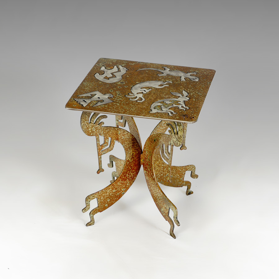 Appraisal: SOUTHWEST KOKOPELLI MOTIF METAL SIDE TABLE Acid treated with brushed