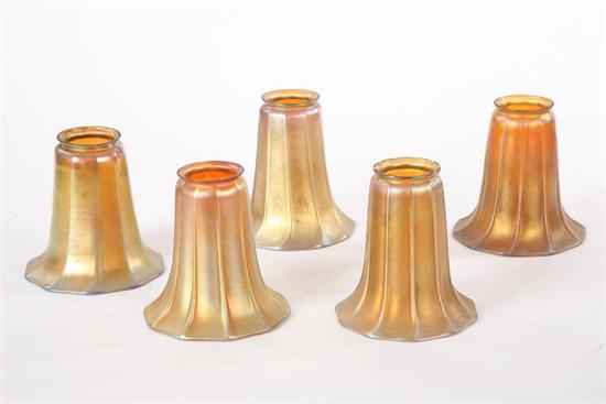 Appraisal: FIVE ART GLASS LIGHT SHADES All ribbed gold Aurene with