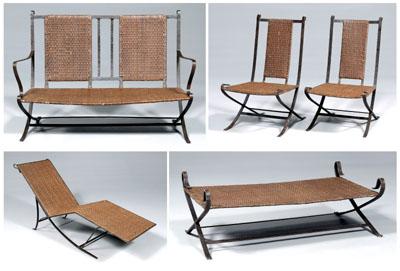 Appraisal: Wrought iron leather patio furniture comprising a settee chaise lounge