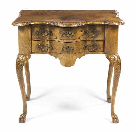 Appraisal: A Chippendale Style Burlwood Side Table having a serpentine top