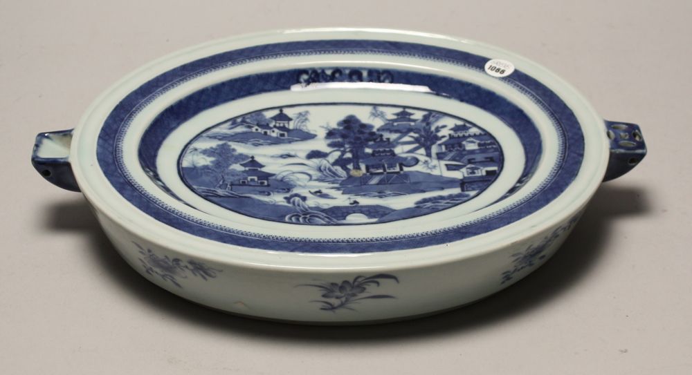 Appraisal: CHINESE EXPORT CANTON PORCELAIN WARMING TRAY Mid- th CenturyIn oval