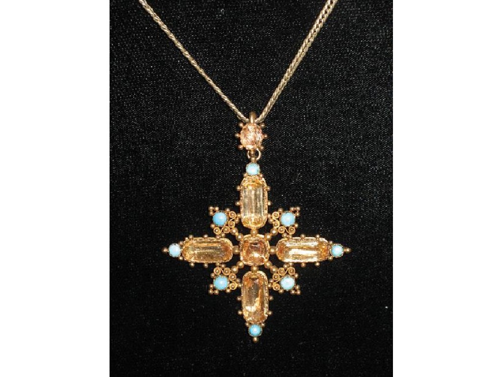 Appraisal: A CLOSED BACK STAR PENDANT set oblong cushion-cut citrines and