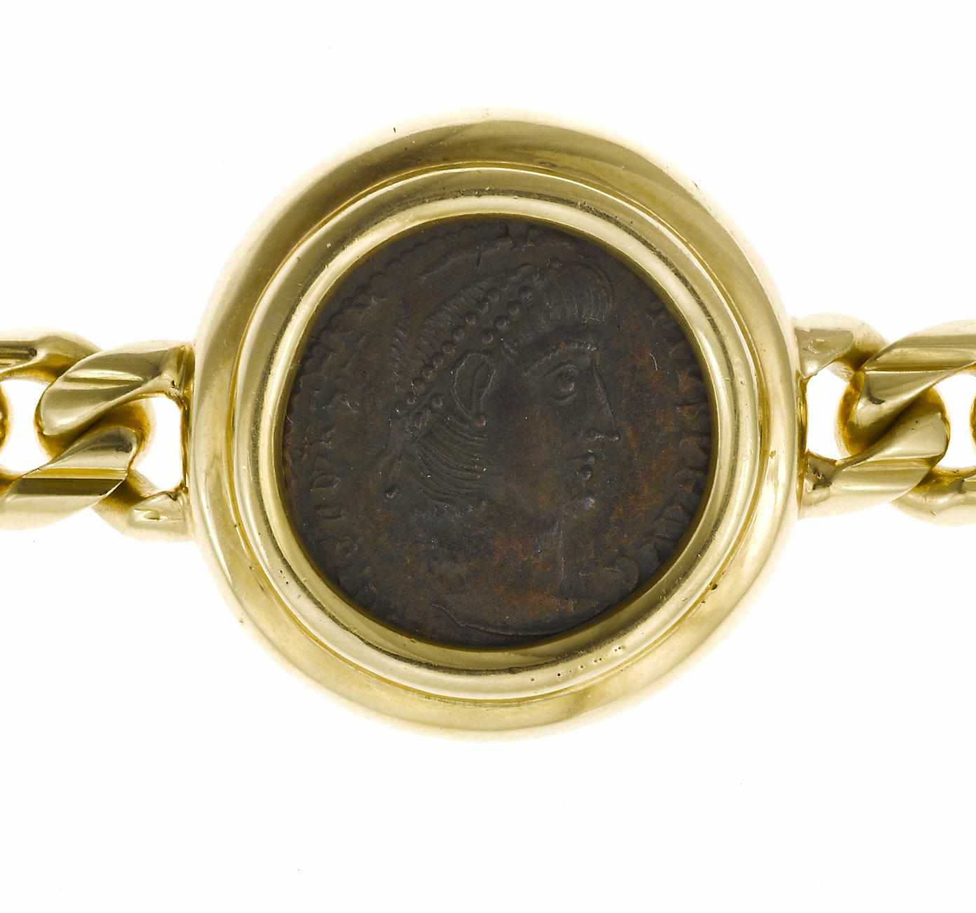 Appraisal: An ancient coin and eighteen karat gold bracelet Bulgari inscribed