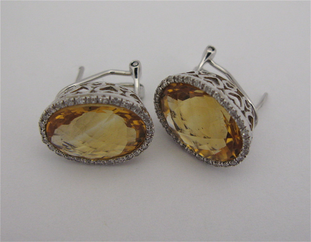 Appraisal: PAIR OF CITRINE DIAMOND AND KARAT GOLD EARRINGS each white