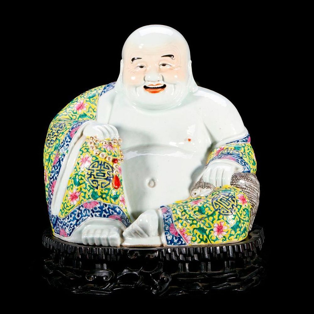 Appraisal: A Chinese porcelain Buddha A large Chinese porcelain smiling Buddha