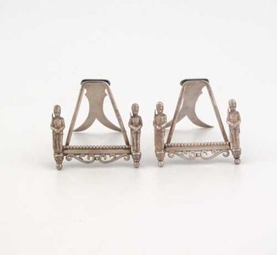 Appraisal: A pair of Victorian menu or place card holders in