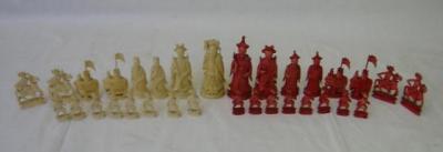 Appraisal: A CHINESE IVORY CHESS SET carved as traditional Oriental figures