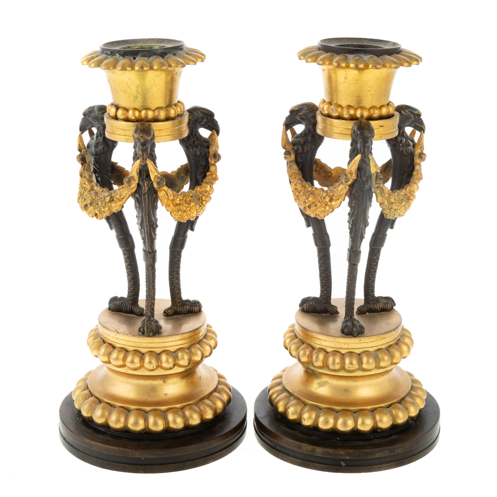 Appraisal: A PAIR OF FRENCH EMPIRE BRONZE CANDLESTICKS th century modeled