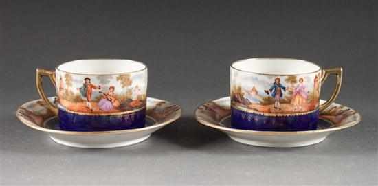 Appraisal: Pair of Royal Vienna style painted transfer decorated cups and