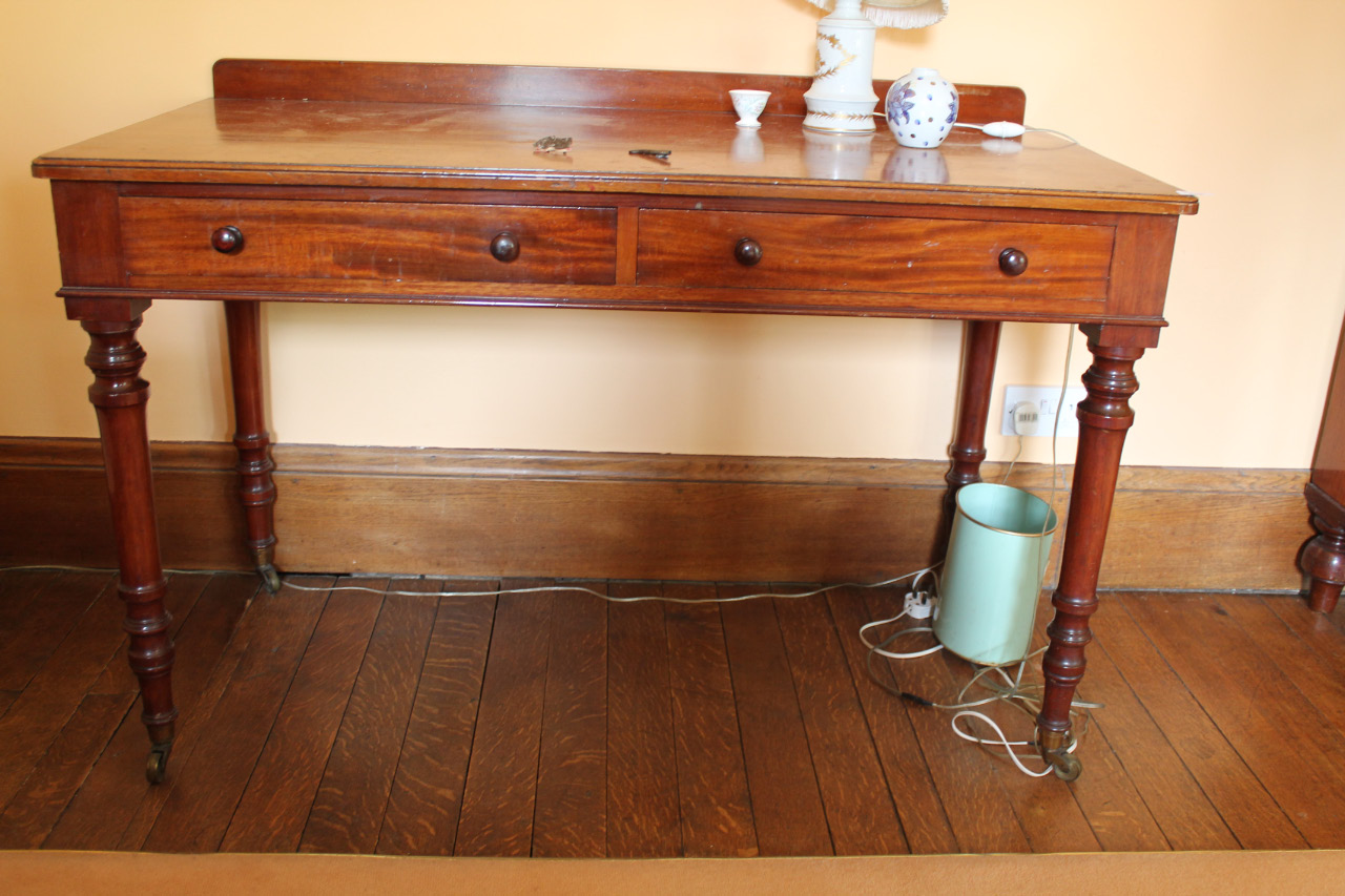 Appraisal: A thC mahogany dressing or writing table by Trollope Sons