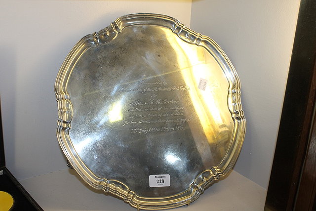 Appraisal: A SILVER SALVER of shaped circular form with pie-crust border