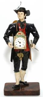 Appraisal: EUROPEAN ENAMELED METAL FIGURAL CLOCK EUROPEAN ENAMELED METAL FIGURAL CLOCK