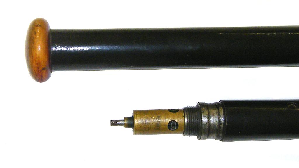 Appraisal: Interesting air gun walking cane with a black painted metal