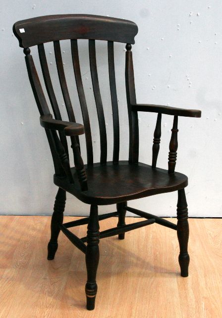 Appraisal: A th century elm and stained beech Windsor armchair