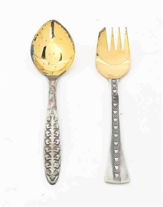 Appraisal: A Set of Russian Sterling Silver Forks and Spoons comprising