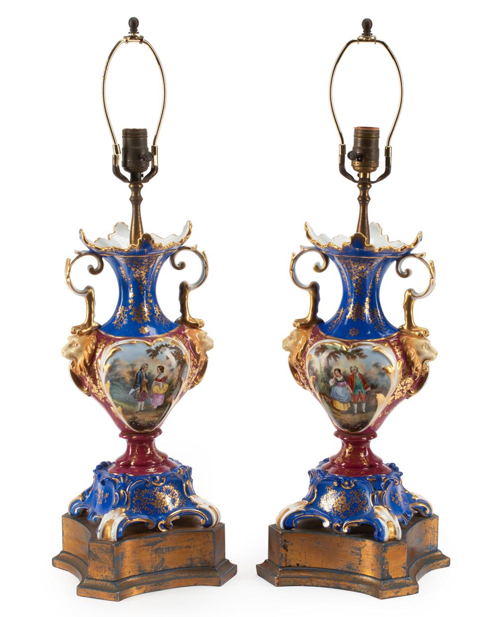 Appraisal: Pair of Victorian Polychrome Porcelain Lamps th c reserves with