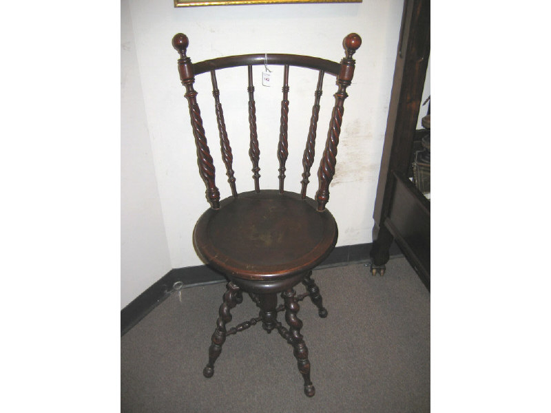 Appraisal: AMERICAN MAHOGANY PIANO STOOL With spiraling spindle back capped by