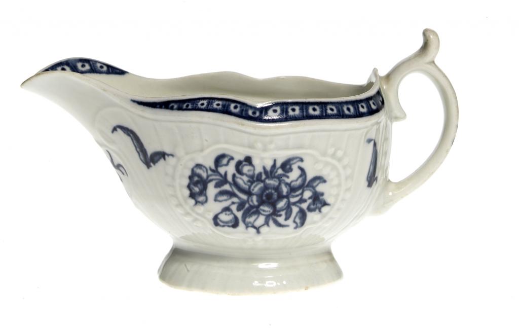 Appraisal: A FIRST PERIOD WORCESTER SAUCE BOAT painted in underglaze blue