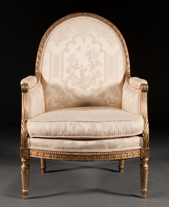 Appraisal: Louis XVI style carved giltwood upholstered bergere late th century