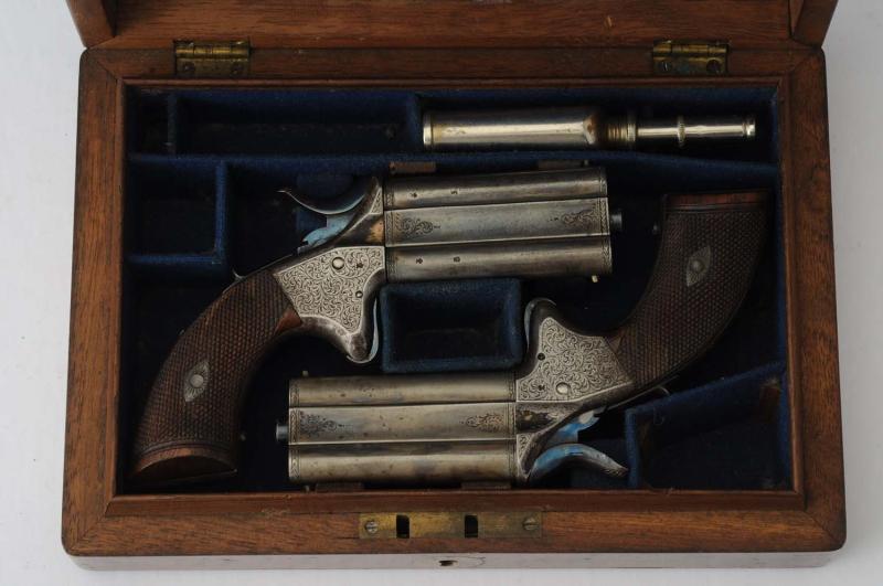 Appraisal: Cased set of two Woodward rim fire Derringer style pistols