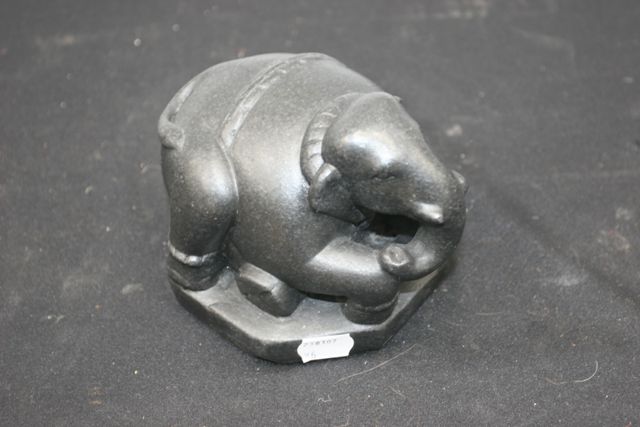 Appraisal: A black marble Mirfiraj in the shape of a crouching