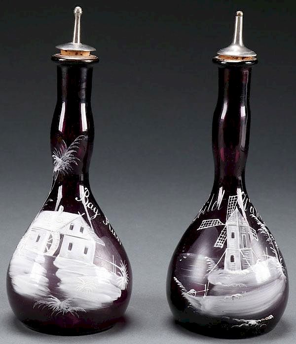 Appraisal: VICTORIAN ENAMELED GLASS BARBER BOTTLES A FINE PAIR OF VICTORIAN