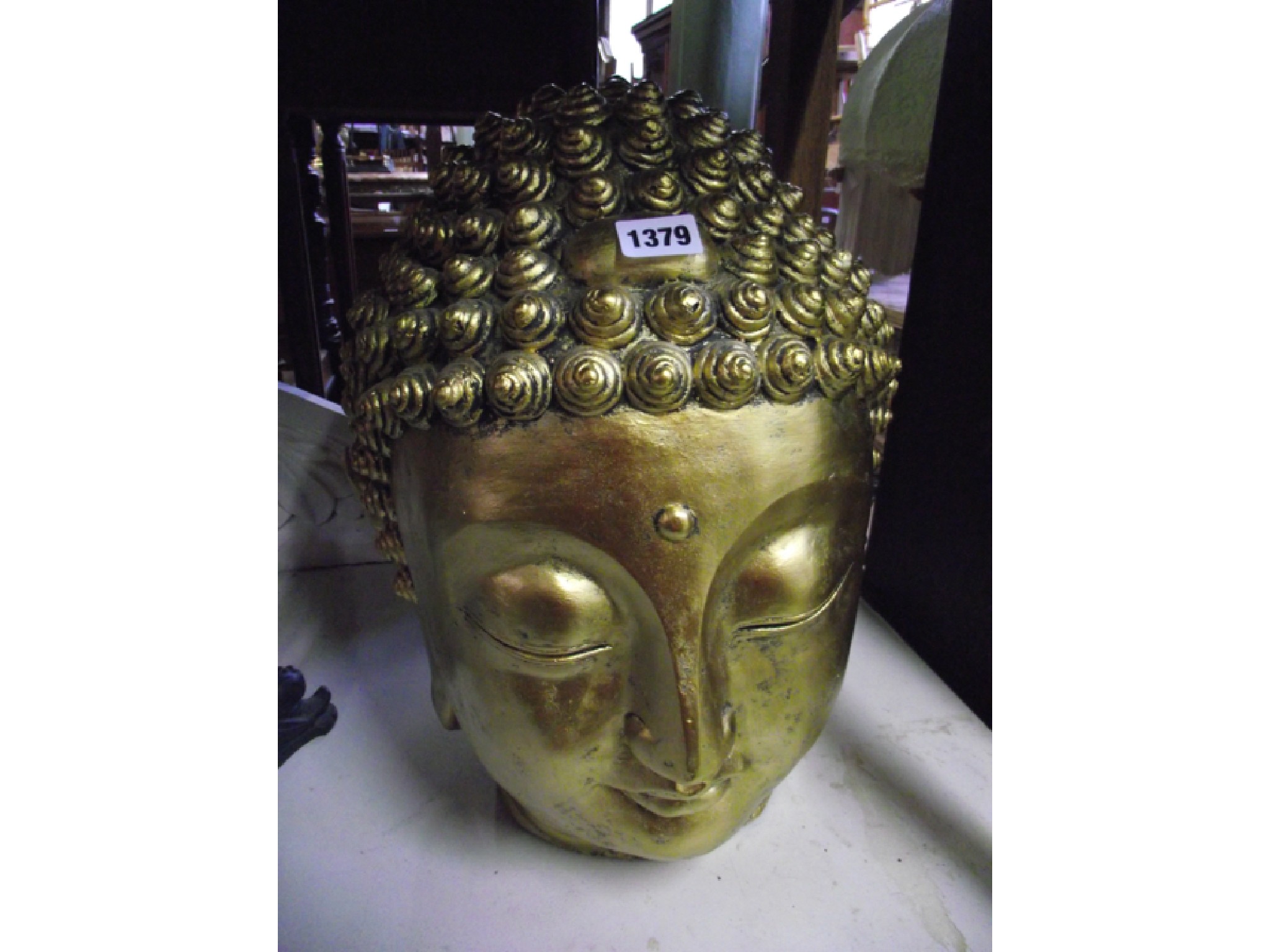 Appraisal: A decorative gilded Thai Buddha's head