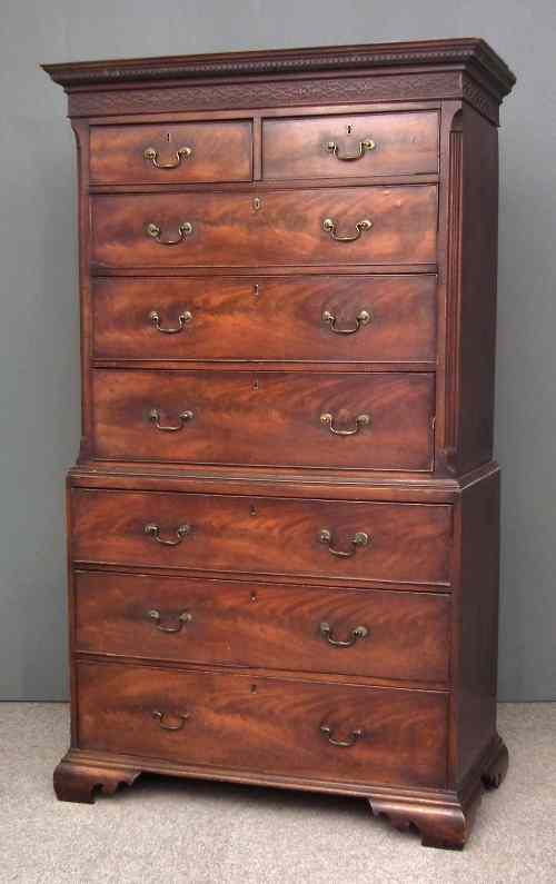 Appraisal: A George III mahogany tallboy with moulded and dentil cornice